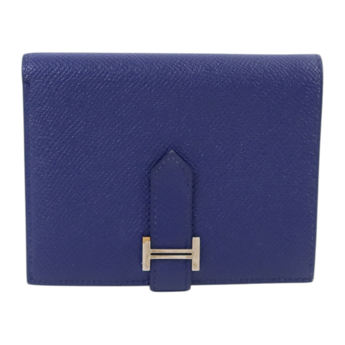 Blue Encre Epsom Leather Bearn Compact Wallet by Hermes with Palladium Hardware: Blue Encre Epsom Leather Bearn Compact Wallet by Hermes with Palladium Hardware The Hermes Bearn Compact wallet is crafted from Epsom calfskin leather in a blue hue. This bi-fold wallet is designed fo
