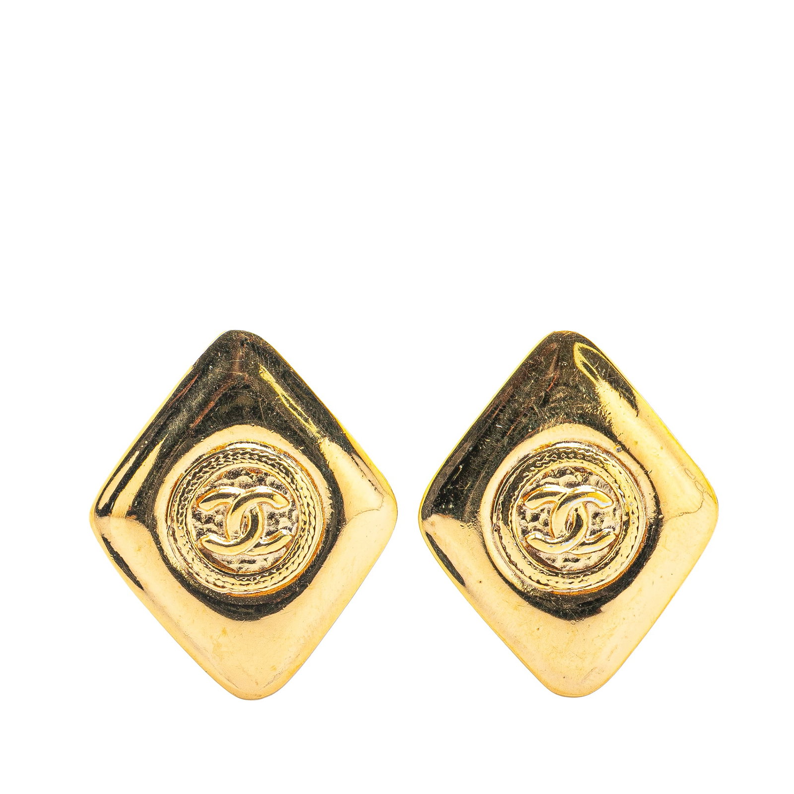 Chanel CC Gold Plated Clip On Earrings: Chanel CC Gold Plated Clip On Earrings These Chanel earrings feature a gold-plated metal design with the iconic CC logo and a convenient clip-on closure. Made in France, they showcase a classic gold c