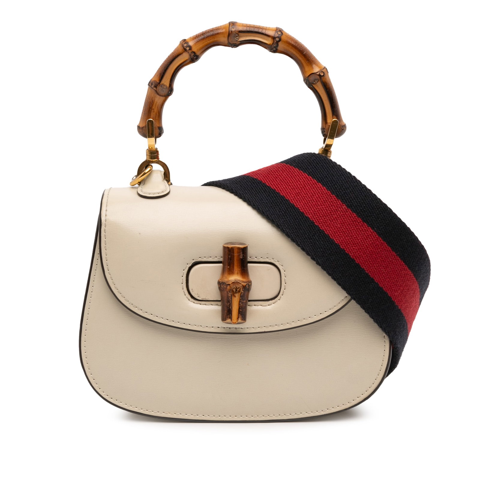 Gucci 1947 Mini Bamboo Handle White Leather Satchel with Canvas Strap: Gucci 1947 Mini Bamboo Handle White Leather Satchel with Canvas Strap This Gucci Mini Calfskin 1947 Bamboo Top Handle Bag features a white leather body, a signature bamboo top handle, a detachable fla