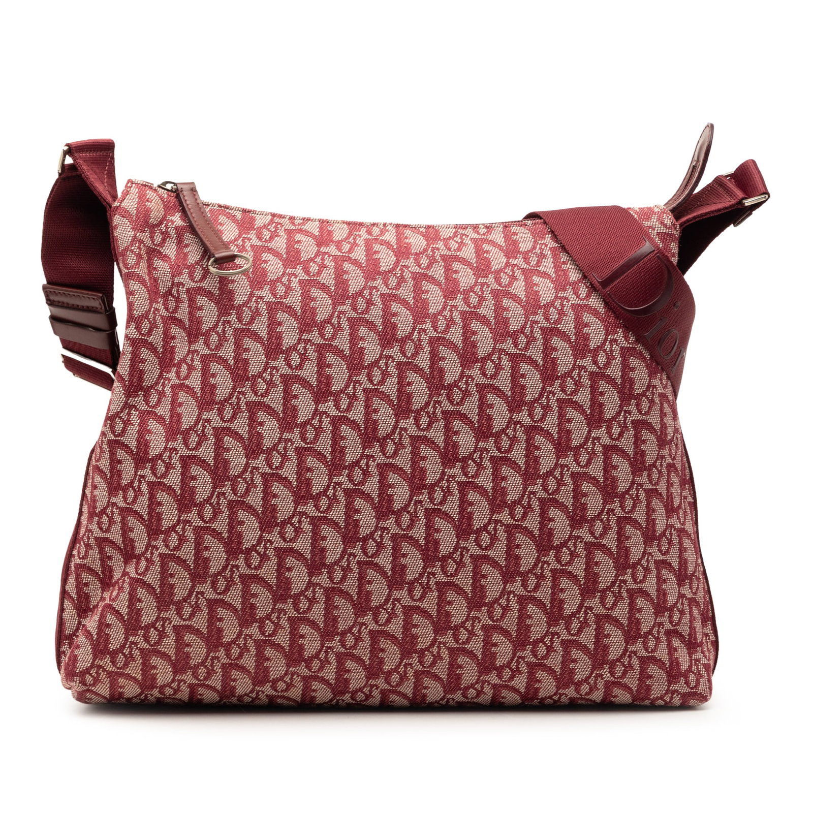 Diorissimo Trotter Canvas Red Crossbody Bag: Diorissimo Trotter Canvas Red Crossbody Bag This Diorissimo Trotter Canvas Crossbody bag features a red canvas body with an adjustable flat strap, a top zip closure, and an interior zip pocket. The ba