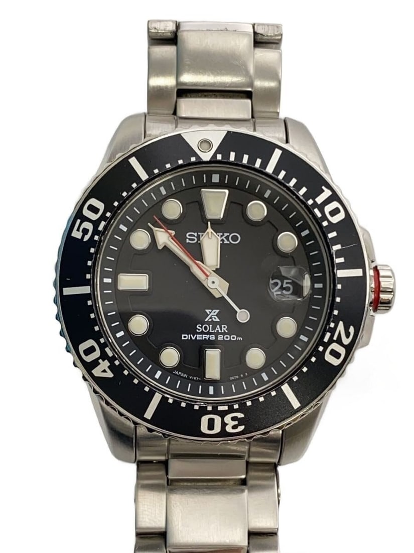 Seiko Prospex Black Stainless Steel Men's Wristwatch: Seiko Prospex Black Stainless Steel Men's Wristwatch This SEIKO PROSPEX V157-0BT0 men's wristwatch features a black dial and a stainless steel case and band. Made in Japan, this slightly used timepiec