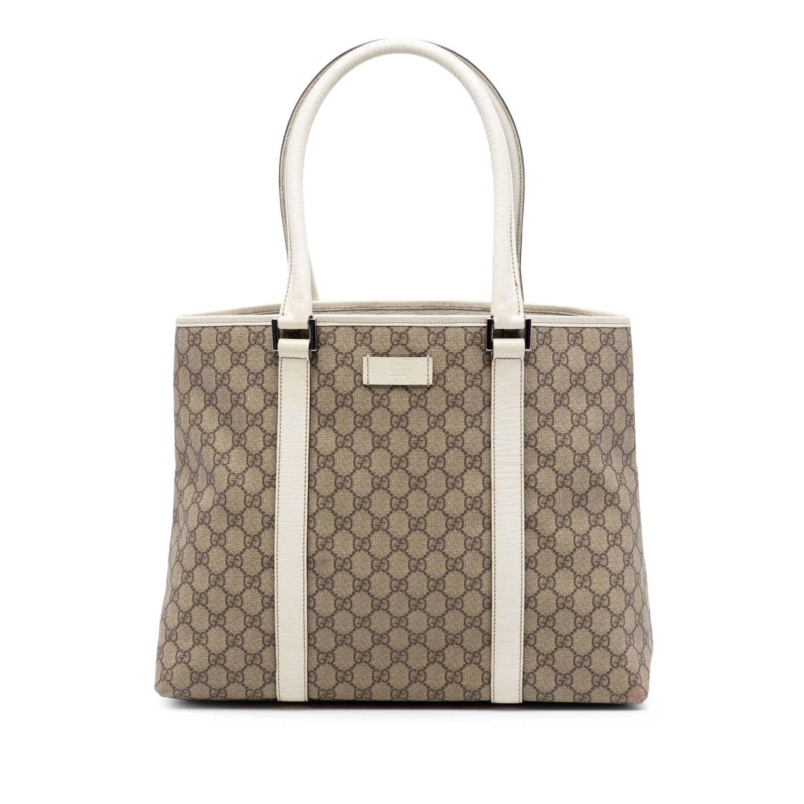 Beige GG Supreme Joy Tote Bag with Leather Trim by Gucci: Beige GG Supreme Joy Tote Bag with Leather Trim by Gucci This Gucci GG Supreme Joy Tote features a coated canvas exterior with leather trim and rolled leather straps. It has an open top with a magneti