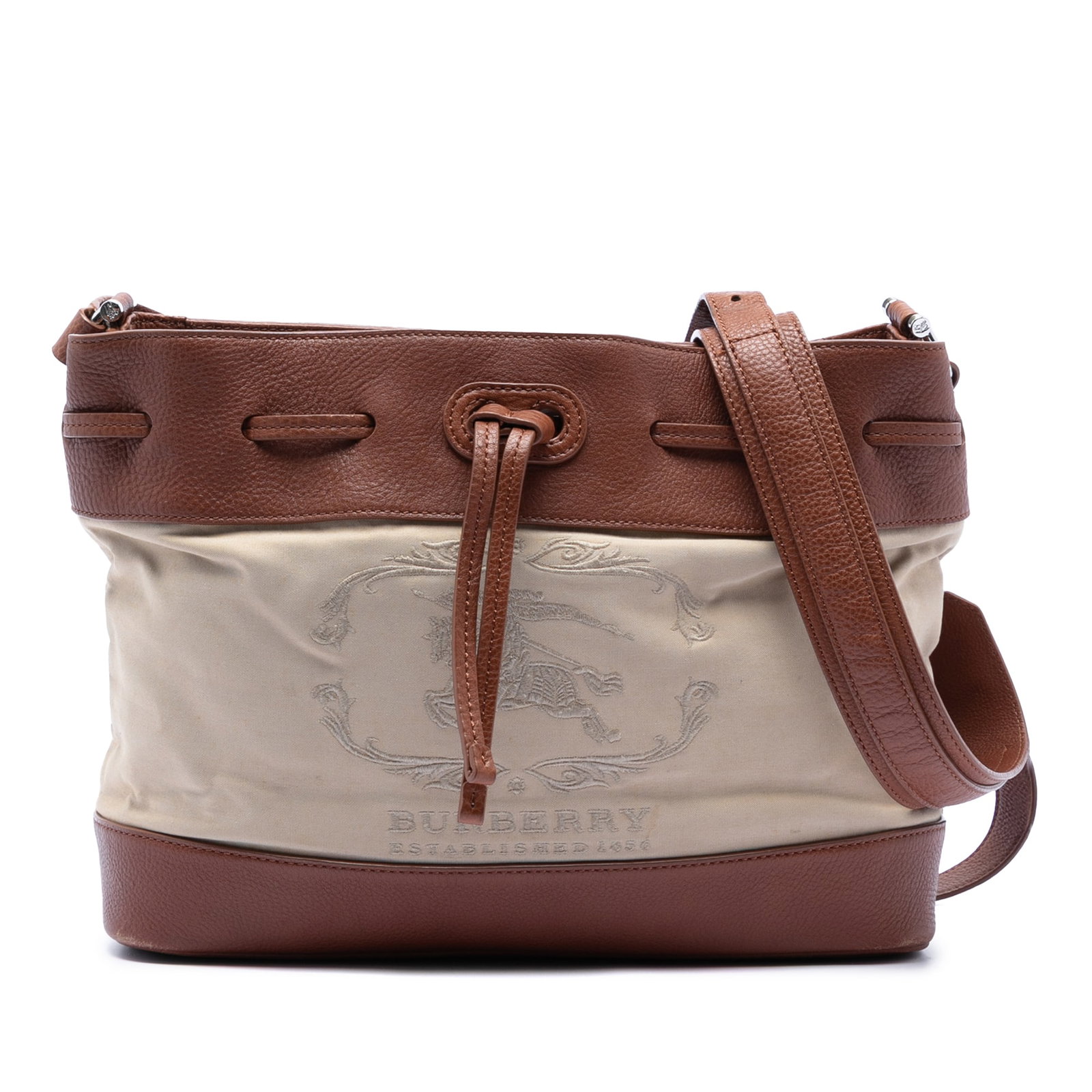 Burberry Canvas Bucket Bag with Leather Accents and Drawstring Top: Burberry Canvas Bucket Bag with Leather Accents and Drawstring Top This Burberry bucket bag features a canvas body with leather trim and an adjustable flat leather strap. It is designed with an open t