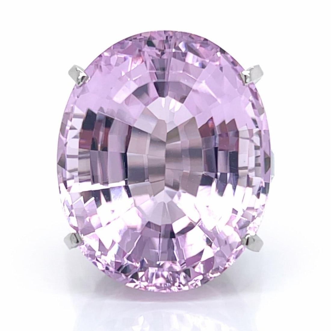 30 Carat Kunzite Gemstone Ring in Platinum Setting Size 7.5: 30 Carat Kunzite Gemstone Ring in Platinum Setting Size 7.5 This platinum ring features an approximately 30.00 carat kunzite gemstone. The ring weighs 14.3 grams and is a size 7.5. It is offered in pr