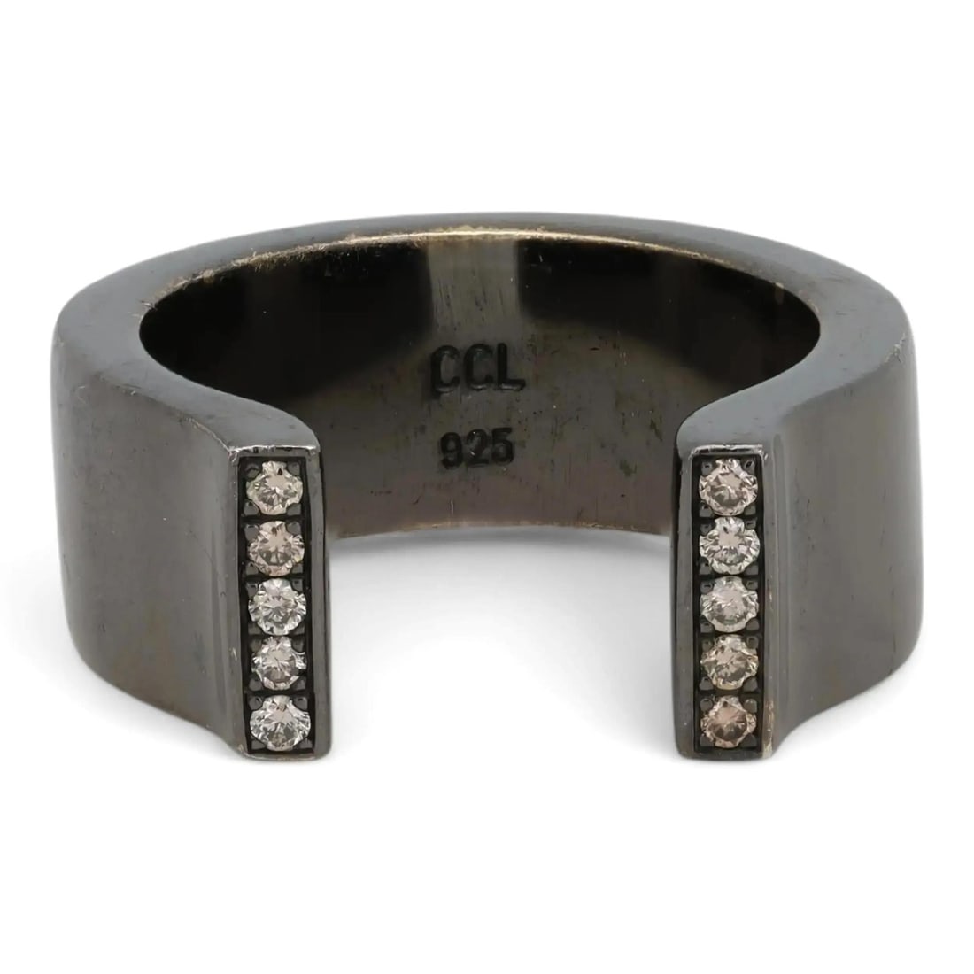 Sterling Silver Open Band Ring With Champagne Diamonds Size 5.5: Sterling Silver Open Band Ring With Champagne Diamonds Size 5.5 This open band ring is crafted from 925 sterling silver and features a bold, contemporary design. The wide band showcases a total of 10 