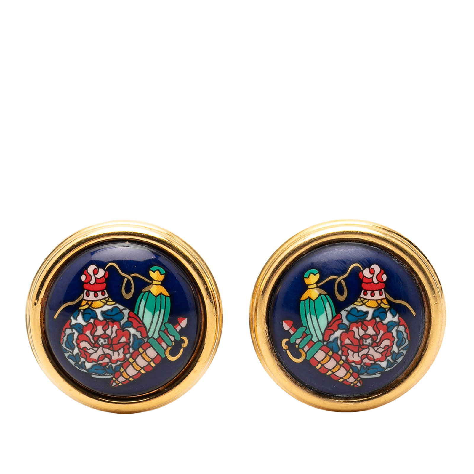 Hermes Blue Printed Enamel Clip On Earrings: Hermes Blue Printed Enamel Clip On Earrings These Hermes earrings feature a printed enamel design with gold-plated bodies and back clip-on closures. Crafted in France, they showcase a round shape and 