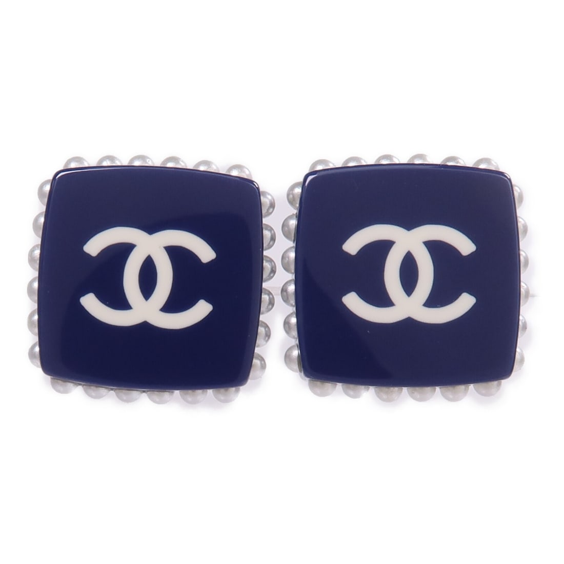 Navy and White PVC Pierced Earrings with CC Logo by Chanel: Navy and White PVC Pierced Earrings with CC Logo by Chanel These CHANEL pierced earrings feature the iconic CC logo in navy and white PVC. Designed for women, they offer a stylish and sophisticated ac