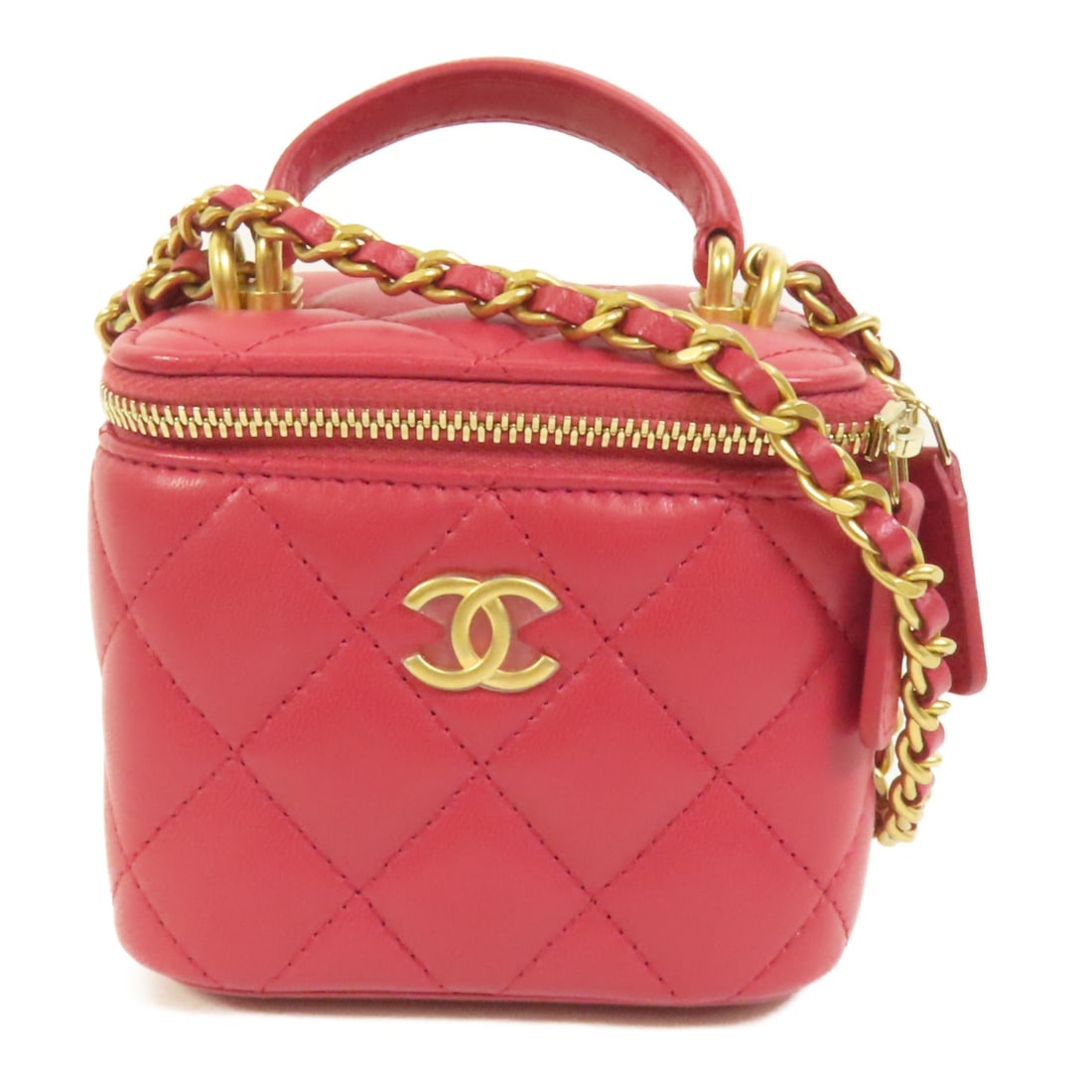 Chanel Mini Vanity Pink Lambskin Bag with Top Handle and Gold Hardware: Chanel Mini Vanity Pink Lambskin Bag with Top Handle and Gold Hardware This CHANEL mini top handle vanity case shoulder bag is crafted from pink lambskin leather and features a classic CC design. The 