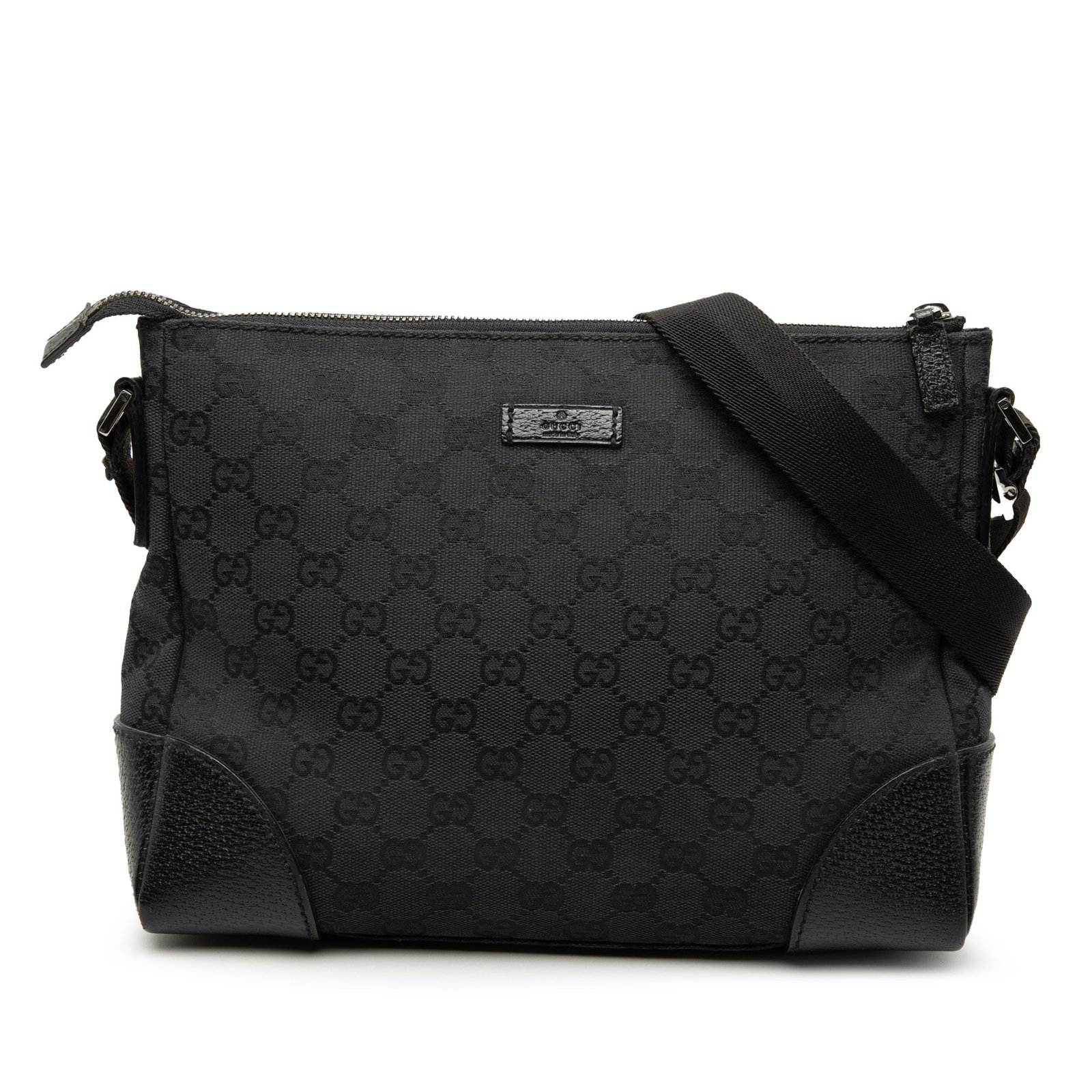 Gucci GG Canvas Black Crossbody Bag: Gucci GG Canvas Black Crossbody Bag This Gucci GG Canvas Crossbody bag features a black canvas body with leather trim, an adjustable flat canvas shoulder strap, a top zip closure, and an interior zip 