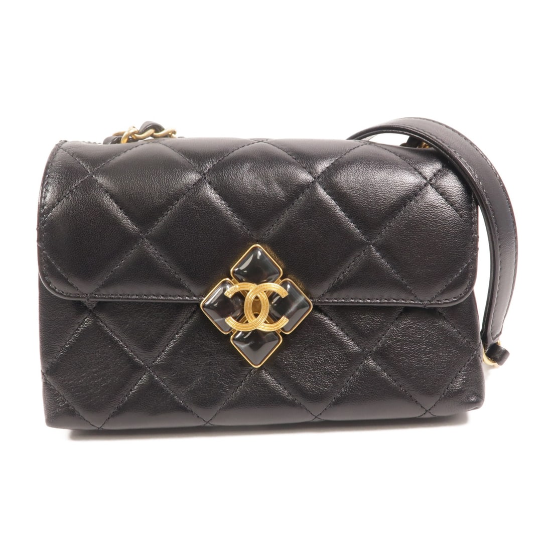 Black CHANEL calfskin shoulder bag with CC GHW: Black CHANEL calfskin shoulder bag with CC GHW This CHANEL shoulder bag is crafted from black calfskin leather, offering a sophisticated and timeless look. Designed with a chain strap and gold-tone ha