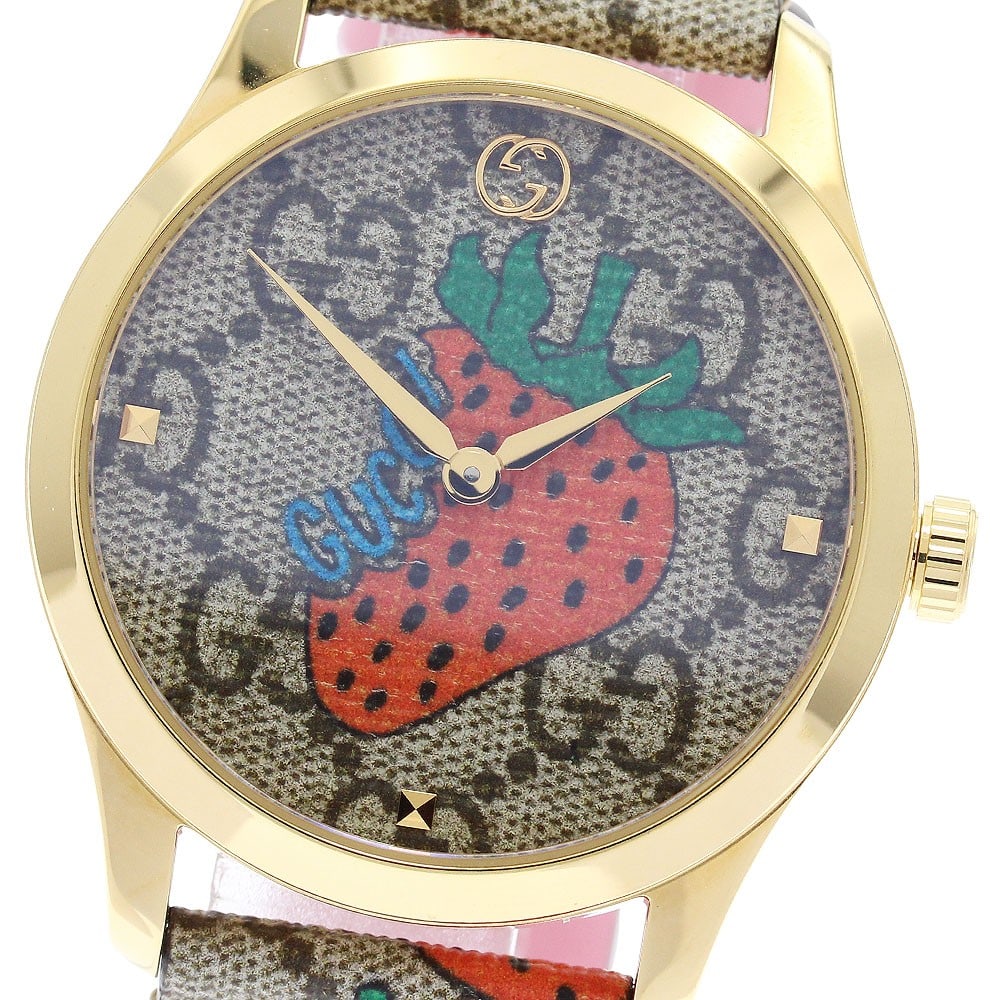 Gucci G Timeless 126.4 YA1264133 Quartz Womens Wristwatch: Gucci G Timeless 126.4 YA1264133 Quartz Womens Wristwatch This pre-owned Gucci G-Timeless Quartz women's wristwatch features a stainless steel and gold-plated case, complemented by a nylon and leather