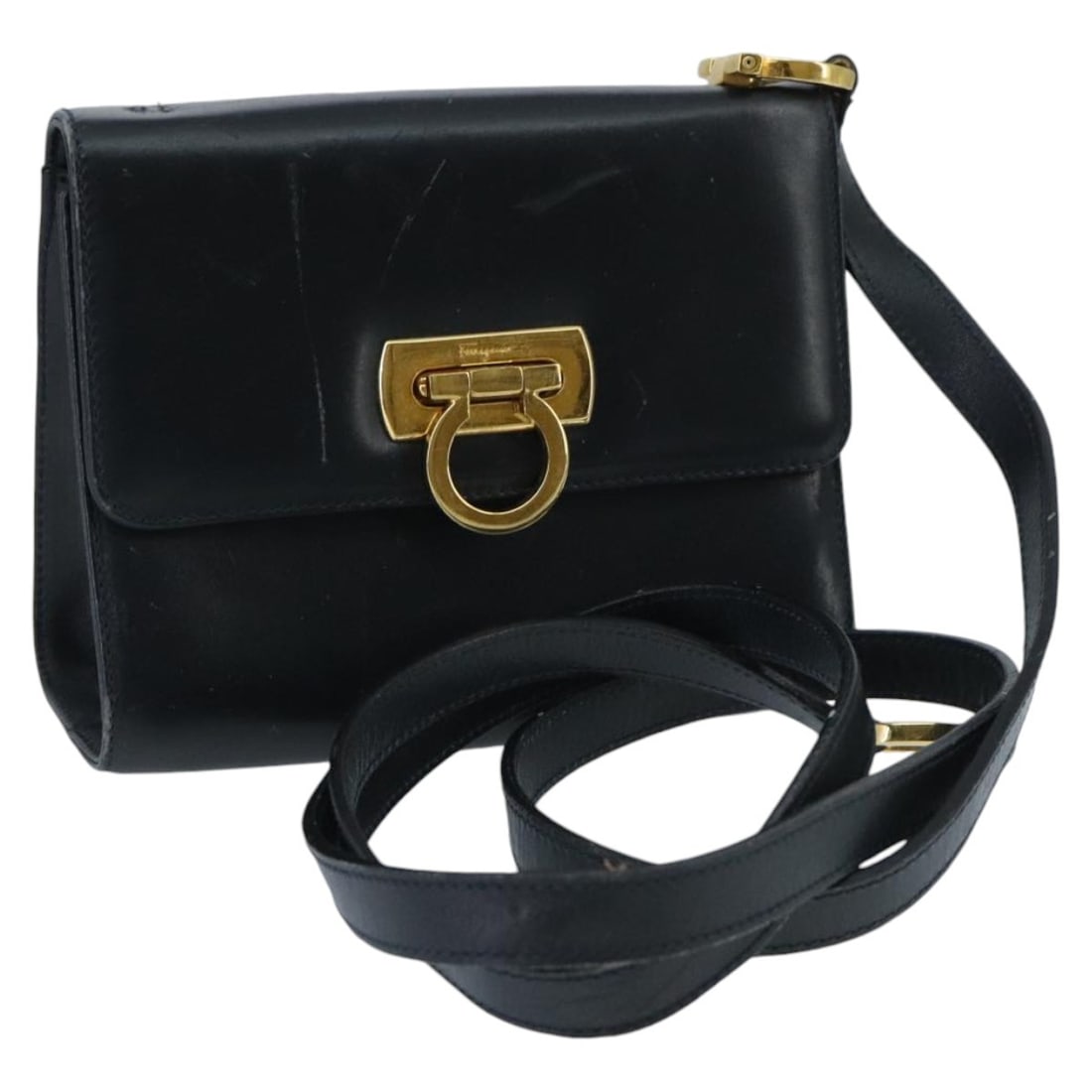 Salvatore Ferragamo Navy Leather Gancini Shoulder Bag Gold Hardware: Salvatore Ferragamo Navy Leather Gancini Shoulder Bag Gold Hardware This Salvatore Ferragamo Gancini shoulder bag is crafted from navy leather with gold-tone accents. Made in Italy, it features a comp