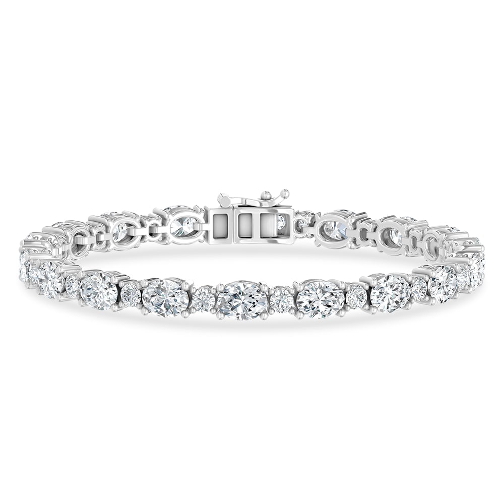 14K White Gold Lab Grown Diamond 11 Ct.Tw. Oavl and Round Fancy Bracelet: 14K White Gold Lab Grown Diamond 11 Ct.Tw. Oavl and Round Fancy Bracelet Crafted in sleek 14K White Gold, this oval and round fancy bracelet is adorned with lab grown diamonds totaling 11 Ct.Tw., deli