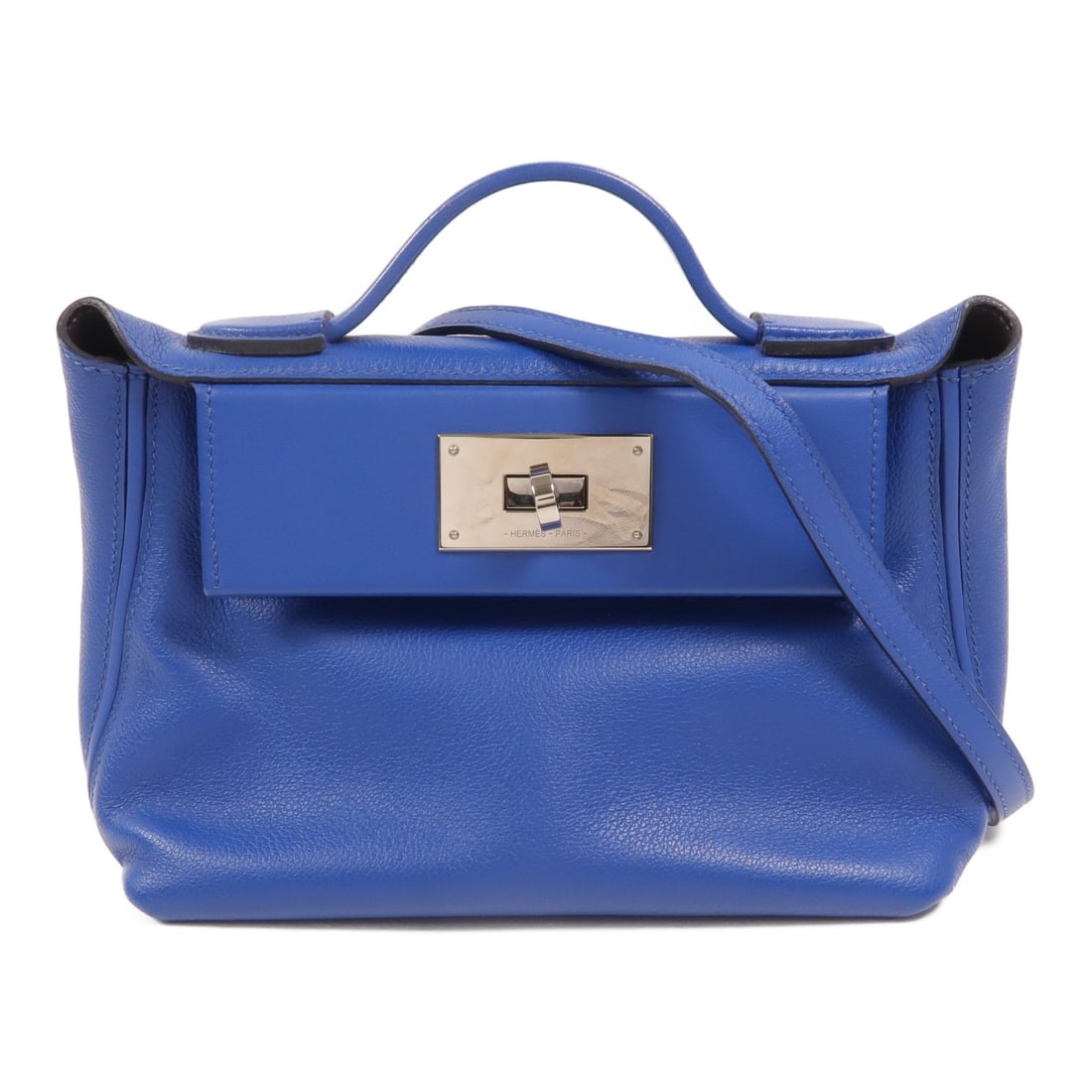 Hermes 24 24 Mini Blue Calfskin 2 Way Shoulder Bag: Hermes 24 24 Mini Blue Calfskin 2 Way Shoulder Bag This Hermes 24/24 Mini 2-way shoulder bag is crafted from Evercolor calfskin leather in a striking blue shade. Designed for versatility, it can be us
