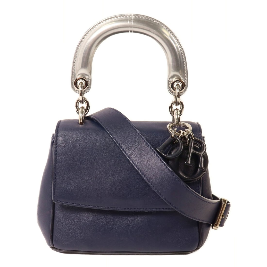 Dior Be Dior Mini Navy Calfskin 2 Way Shoulder Bag: Dior Be Dior Mini Navy Calfskin 2 Way Shoulder Bag This Christian Dior Be Dior Mini Bag offers versatile styling as a two-way shoulder bag. Crafted from navy calfskin leather, it features silver-tone 