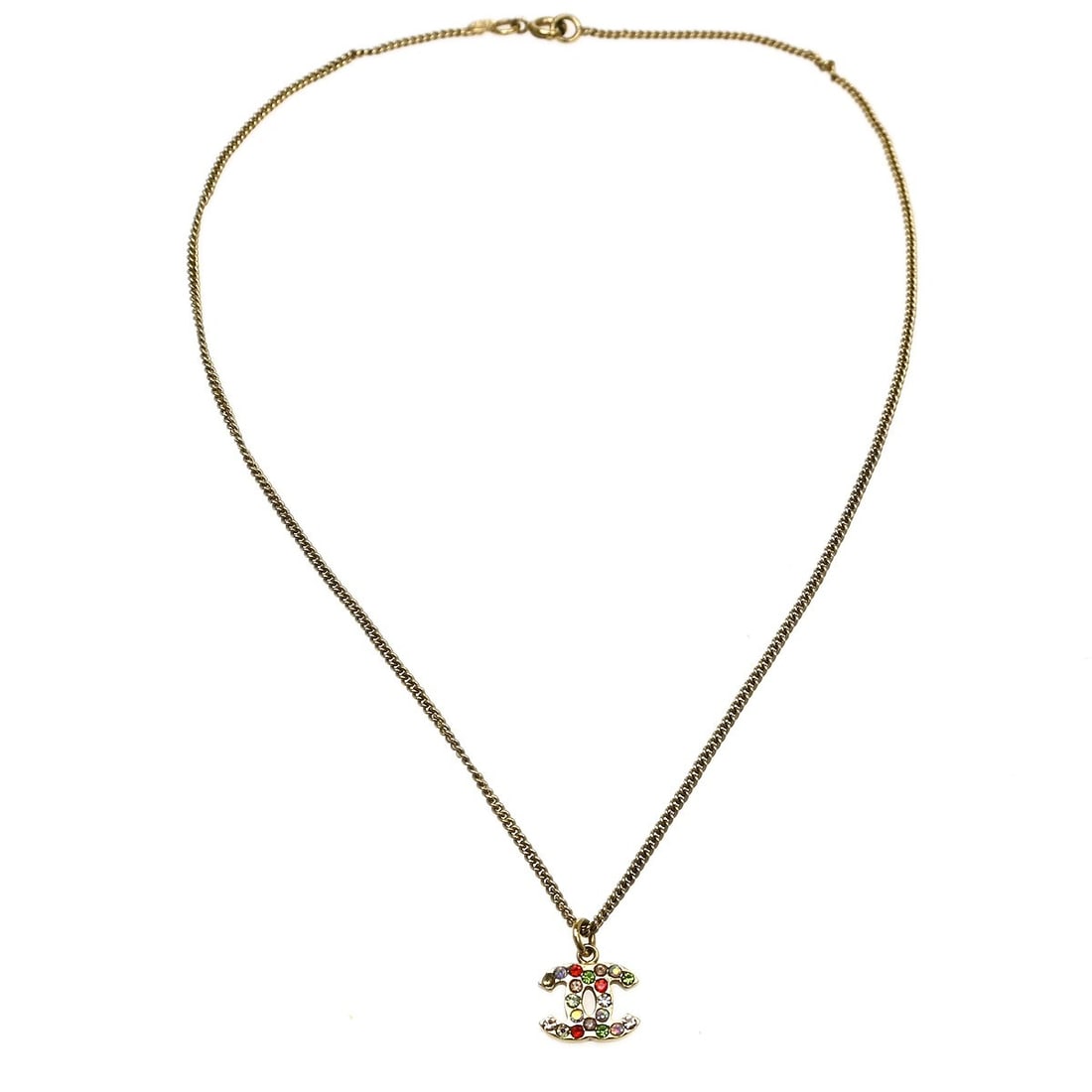 CHANEL gold-plated chain pendant necklace 04A rhinestone vintage: CHANEL gold-plated chain pendant necklace 04A rhinestone vintage This vintage Chanel CC chain pendant necklace features a gold-plated design with sparkling rhinestone accents. Crafted in Italy, the ne