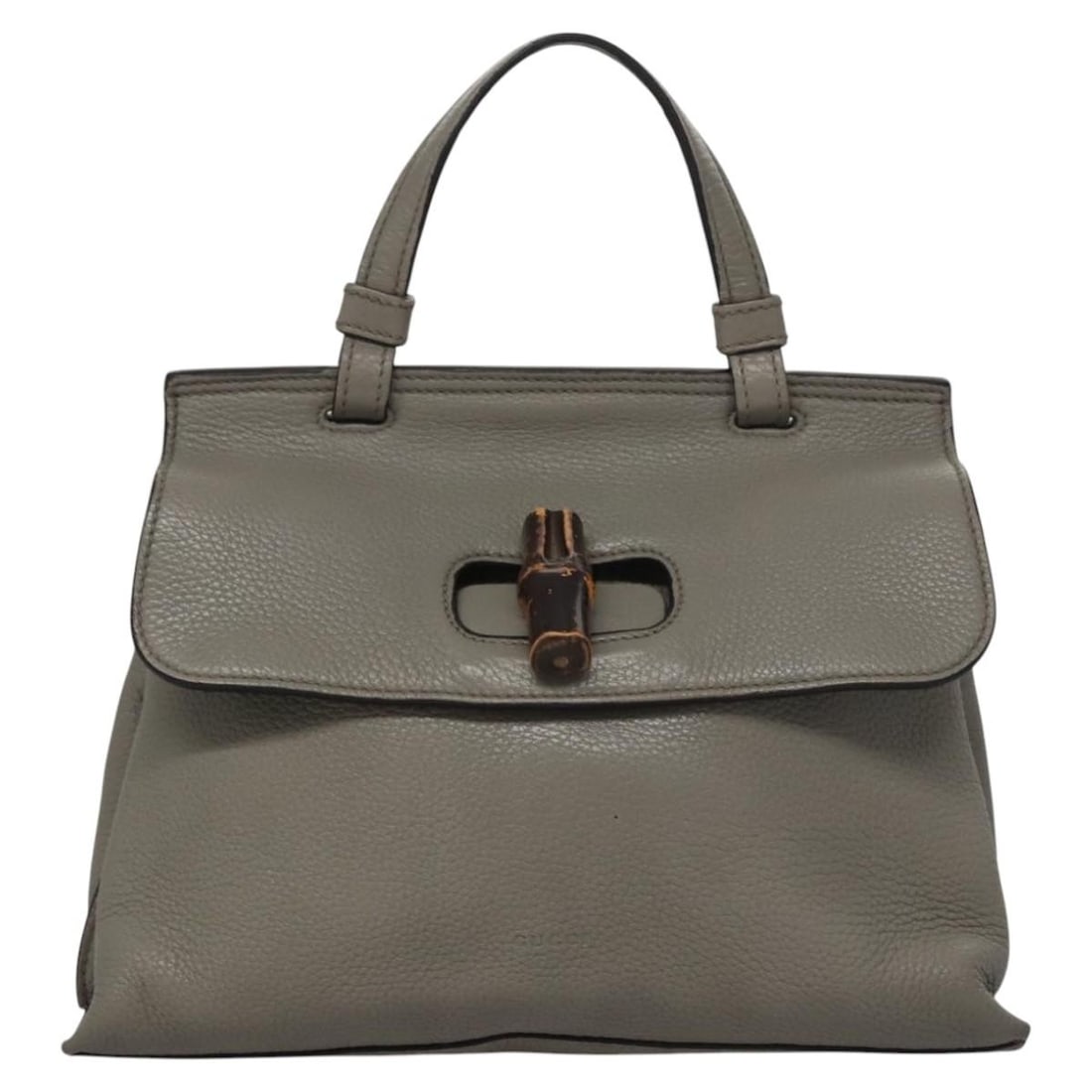 Gucci Bamboo Daily gray leather handbag with top handle: Gucci Bamboo Daily gray leather handbag with top handle The Gucci Bamboo Daily Top Handle Bag features a gray leather exterior with a bamboo top handle. Designed for women, this Italian-made bag is cr
