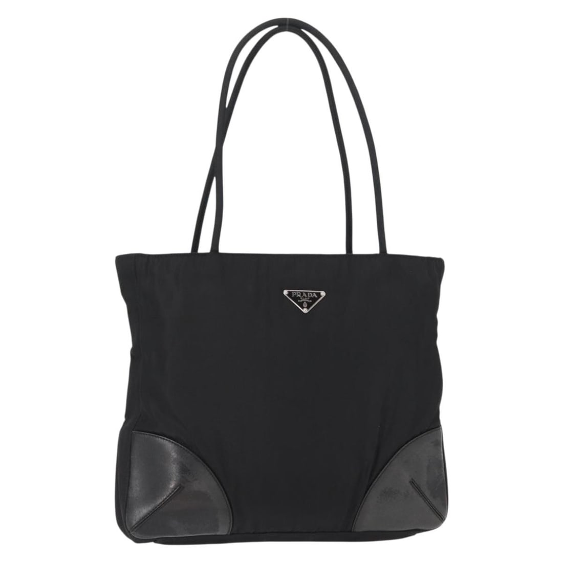 Prada black nylon leather tote bag Italy 11 x 9.8 inch: Prada black nylon leather tote bag Italy 11 x 9.8 inch This PRADA tote bag is crafted from black nylon with silver-tone accents and features leather trim. Designed for women, the bag offers a spacious