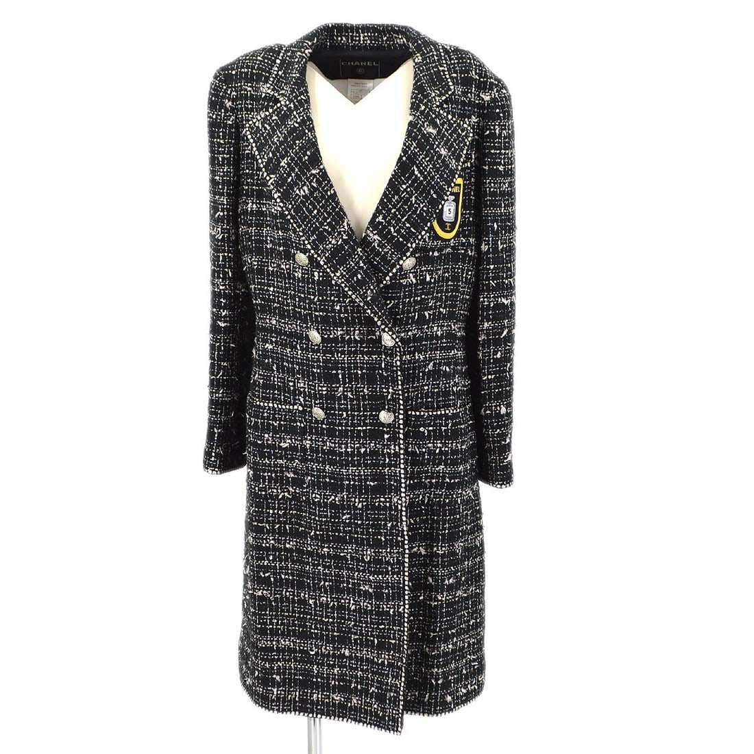 Chanel black tweed long coat size 40: Chanel black tweed long coat size 40 This vintage Chanel coat features a classic black tweed pattern with a long silhouette and collared design. Crafted in France, it is made from a blend of acrylic a