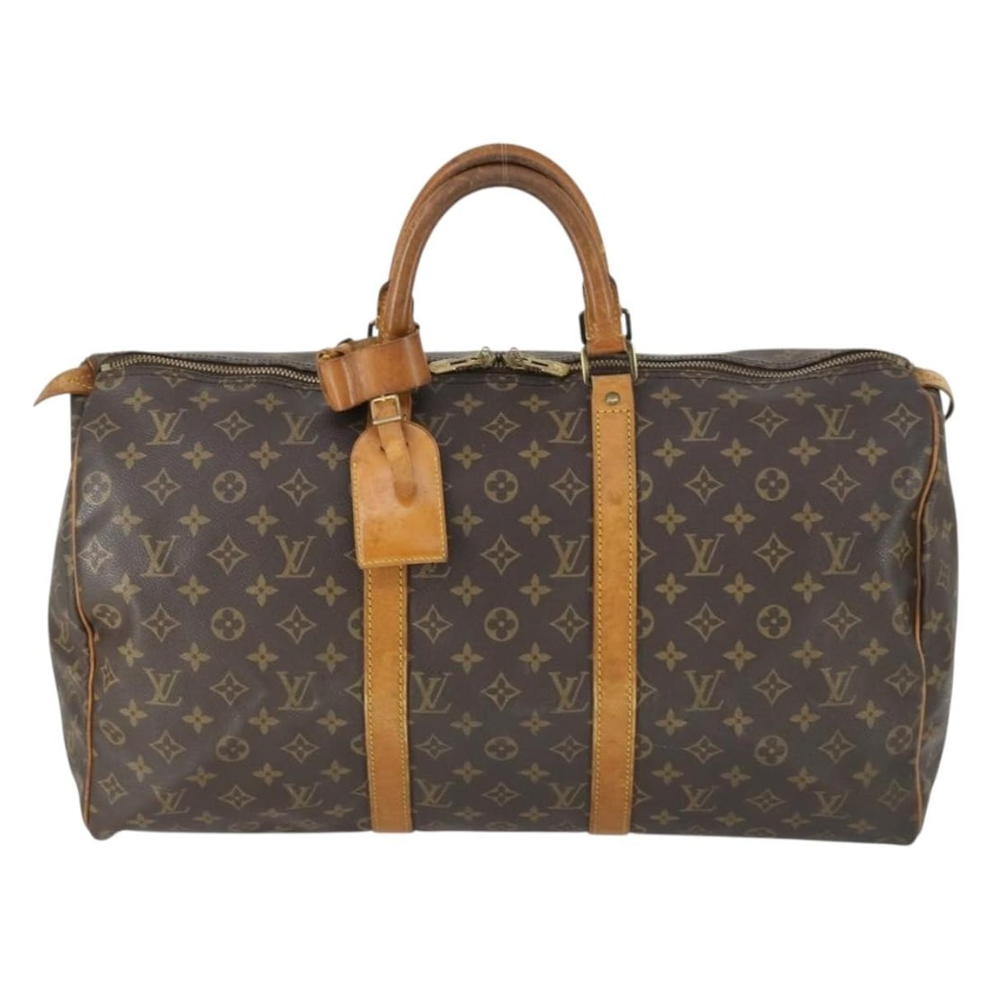 Keepall Monogram Brown Canvas Unisex Travel Bag by Louis Vuitton: Keepall Monogram Brown Canvas Unisex Travel Bag by Louis Vuitton This Louis Vuitton Keepall Bag features the iconic Monogram canvas design in brown, crafted for unisex use. The bag shows signs of wear