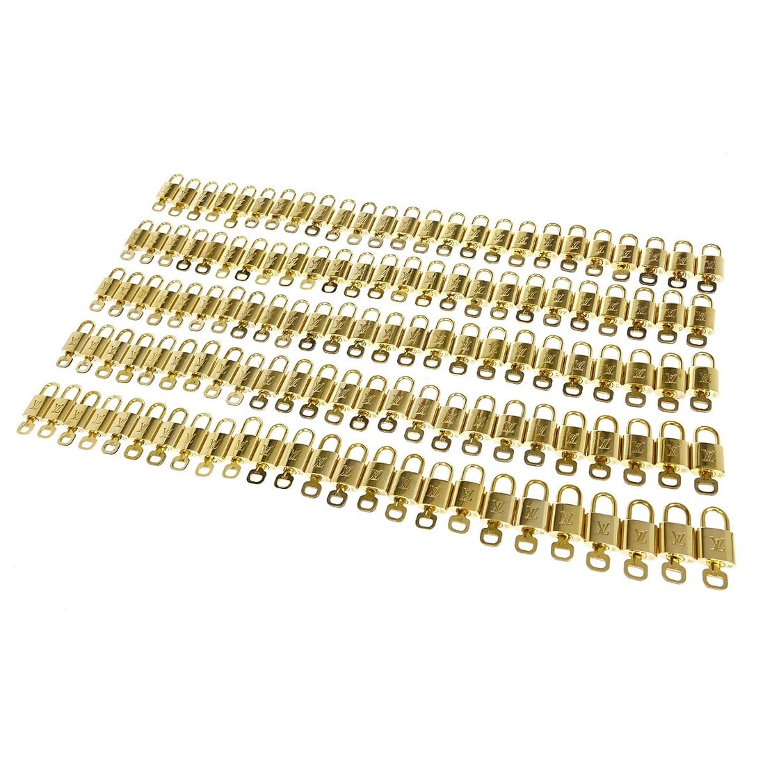 Louis Vuitton gold padlock and key charm set 125 pieces: Louis Vuitton gold padlock and key charm set 125 pieces This is a Louis Vuitton padlock and key bag accessory set featuring a total of 125 pieces in a gold color. Designed for unisex use, these padloc
