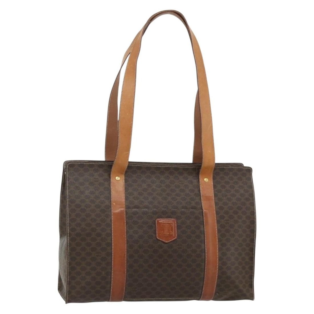 CELINE Macadam PVC Leather Brown Gold Tote Bag Italy: CELINE Macadam PVC Leather Brown Gold Tote Bag Italy This CELINE Macadam tote bag features a brown and gold color scheme and is crafted from PVC leather with Macadam canvas detailing. The tote is desi