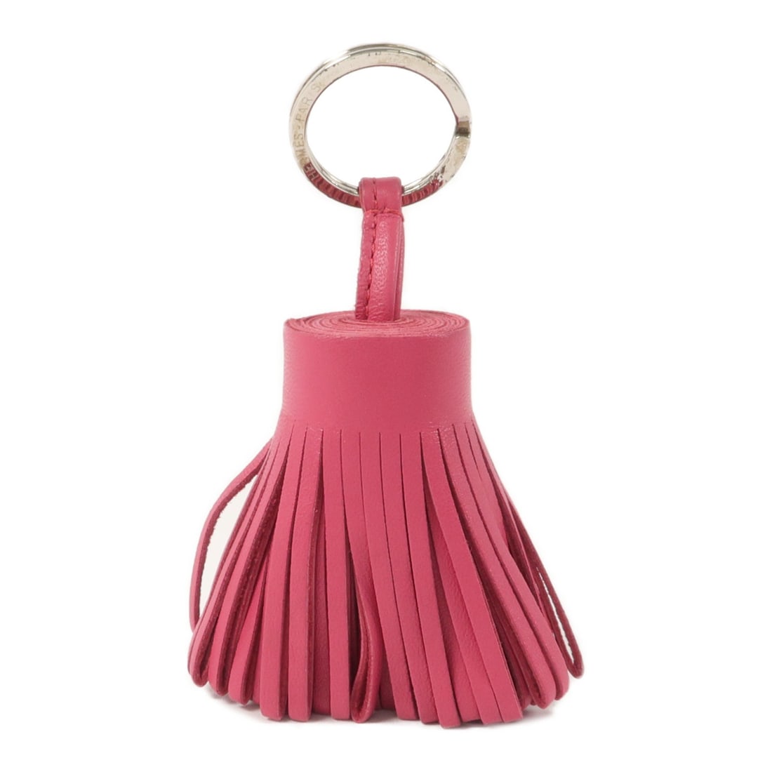 Hermes Carmen key ring fuchsia Milo leather PHW: Hermes Carmen key ring fuchsia Milo leather PHW This Hermes Carmen keychain is crafted from soft Milo lambskin leather in a vibrant fuchsia pink color. Designed as a stylish accessory, it is suitable 