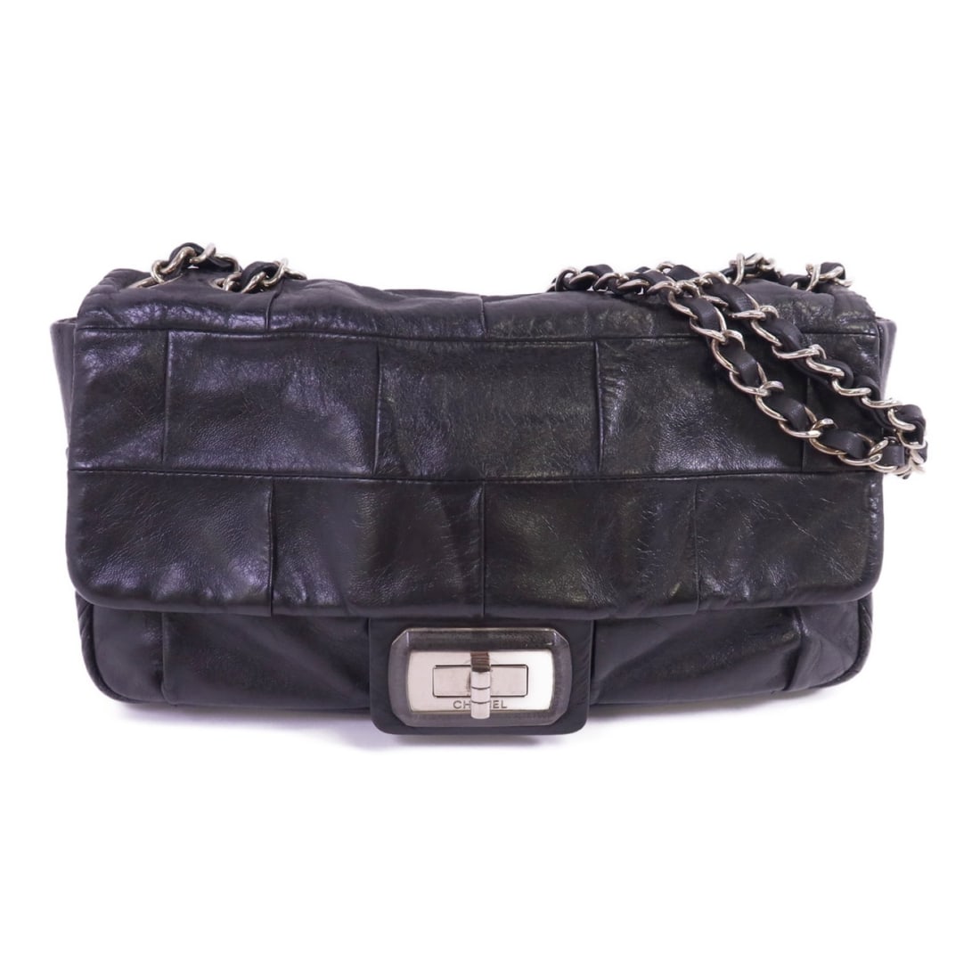Black Calfskin Leather Chanel Shoulder Bag with Silver Tone CC Chain: Black Calfskin Leather Chanel Shoulder Bag with Silver Tone CC Chain This CHANEL shoulder bag features a classic black calfskin leather exterior with silver-tone hardware. Made in France, it offers a 