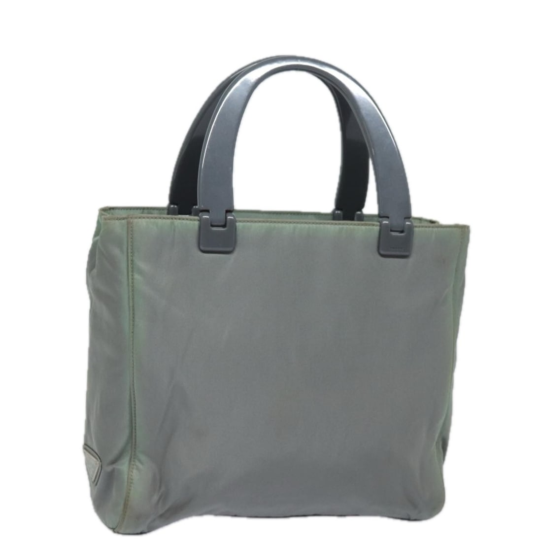 Prada gray nylon handbag made in Italy 9.8 x 9.1 x 2.4 inch: Prada gray nylon handbag made in Italy 9.8 x 9.1 x 2.4 inch This PRADA handbag is crafted from gray nylon and features a compact, structured silhouette. Designed for women, it offers practical dimensi