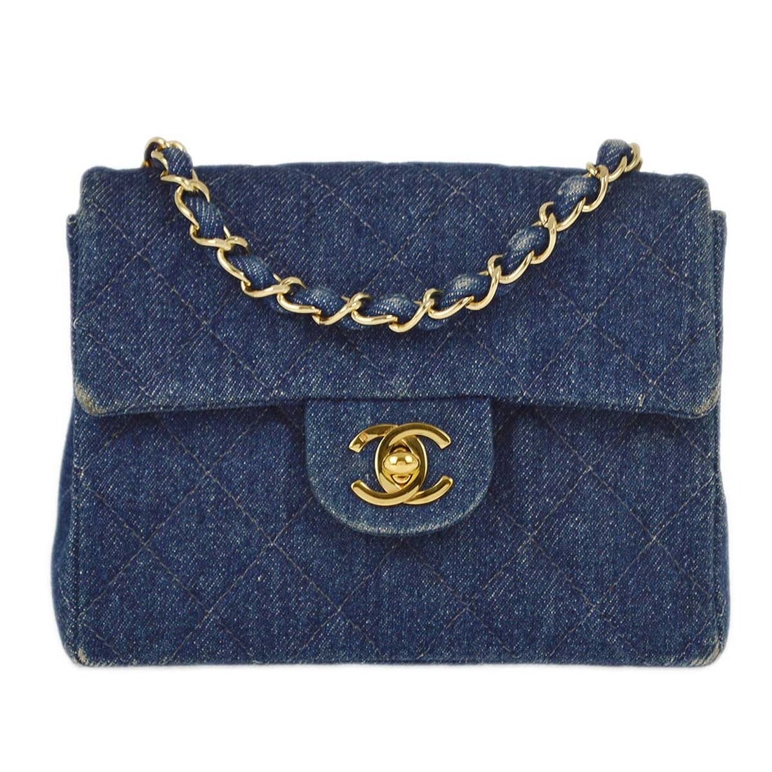 CHANEL blue denim quilted flap crossbody bag gold hardware: CHANEL blue denim quilted flap crossbody bag gold hardware This Chanel Blue Denim Mini Classic Square Flap Shoulder Bag features a quilted matelasse pattern and a compact, structured silhouette. Craft