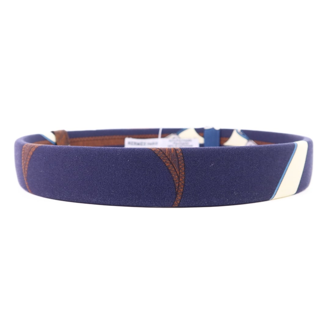 Silk Navy Hair Band from Hermes Multicolor Design: Silk Navy Hair Band from Hermes Multicolor Design This Hermes hair band features a stylish design crafted from silk in navy with multicolor accents. Made in France, it offers a luxurious accessory opt