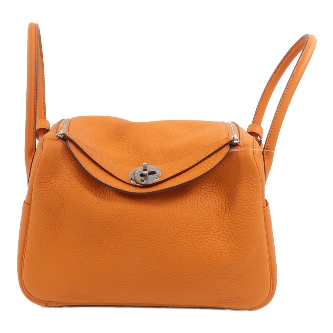 Hermes Lindy 26 Orange Taurillon Clemence Leather Shoulder Bag: Hermes Lindy 26 Orange Taurillon Clemence Leather Shoulder Bag This Hermes Lindy 26 is a versatile 2-way shoulder bag crafted from Taurillon Clemence calfskin leather in a vibrant orange color. Design