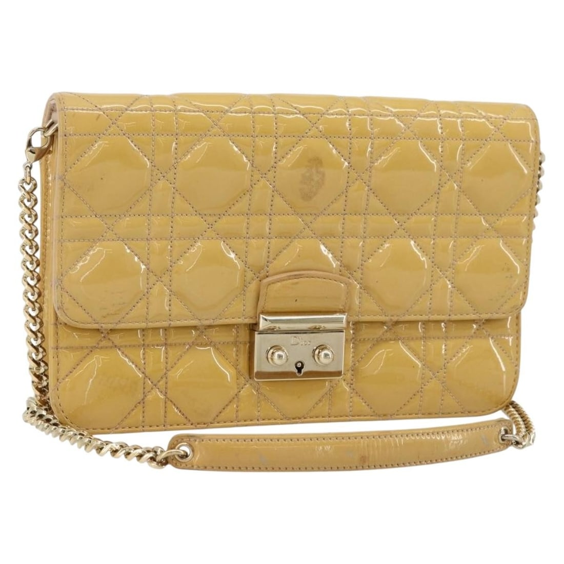 Christian Dior beige patent leather Canage shoulder bag gold tone: Christian Dior beige patent leather Canage shoulder bag gold tone This Christian Dior Canage chain shoulder bag is crafted from beige and gold patent leather, offering a sophisticated and stylish look