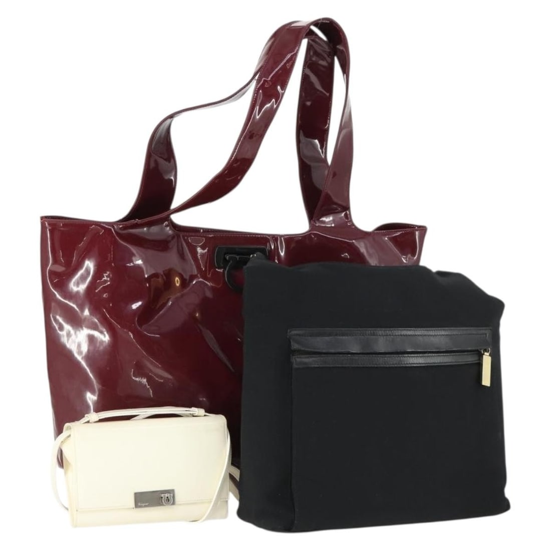 Salvatore Ferragamo Patent Leather Shoulder Bags Trio in White Black Bordeaux: Salvatore Ferragamo Patent Leather Shoulder Bags Trio in White Black Bordeaux This is a Salvatore Ferragamo shoulder bag set crafted from leather in white, black, and bordeaux colors. The set is made 