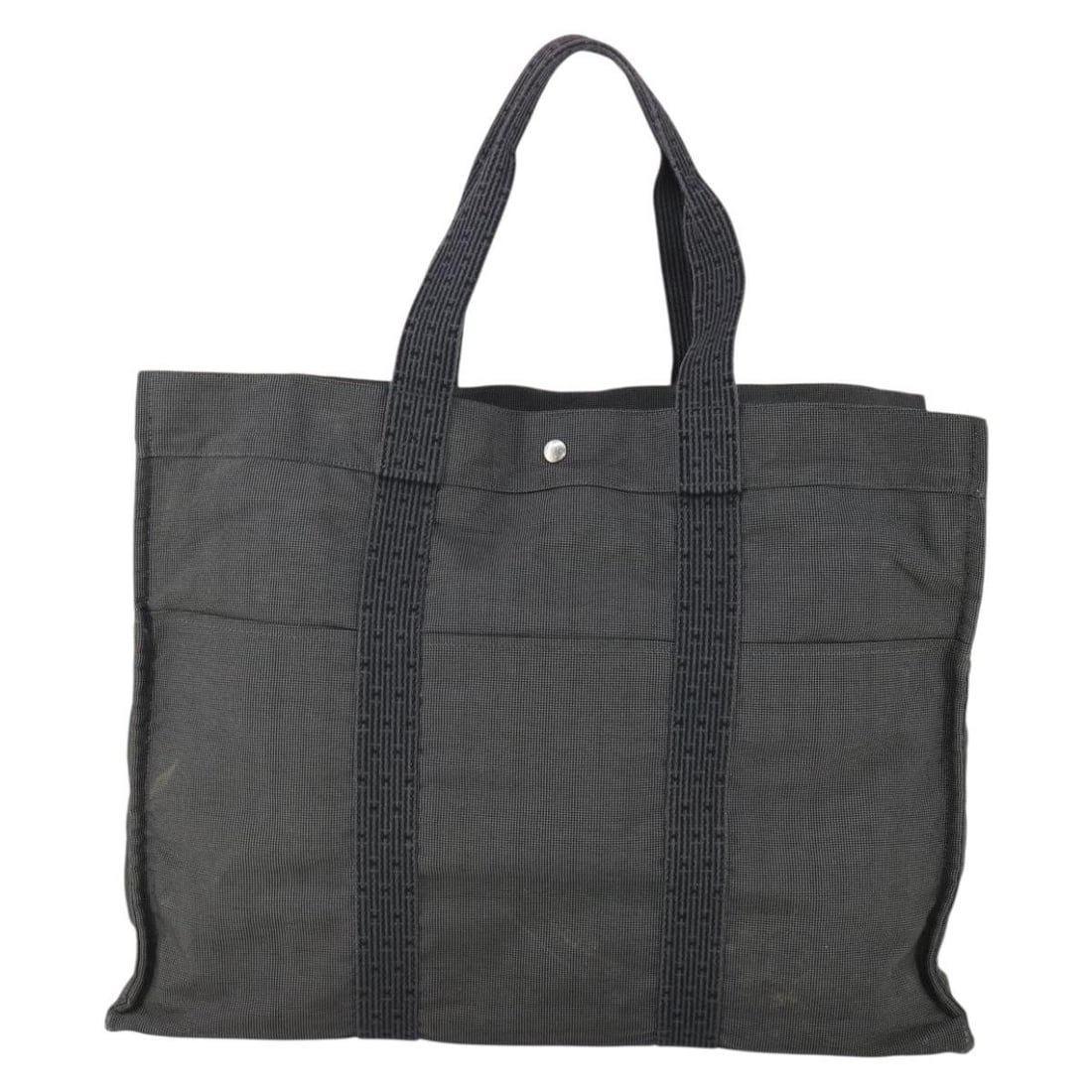 Hermes Herline Large Gray Canvas Tote Bag 57cm by 43cm by 25cm: Hermes Herline Large Gray Canvas Tote Bag 57cm by 43cm by 25cm Hermes Fourre-tout Herline canvas tote designed for women, featuring a gray canvas exterior with visible wear including surface shape los