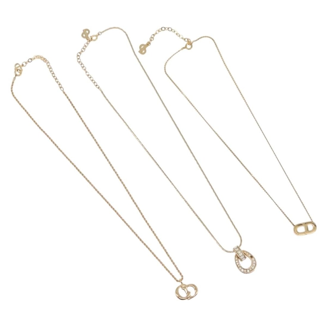 Christian Dior gold tone metal necklace trio: Christian Dior gold tone metal necklace trio This is a set of three Christian Dior women's necklaces crafted from gold tone metal. The set is offered as a special bundle, and only the items shown in t