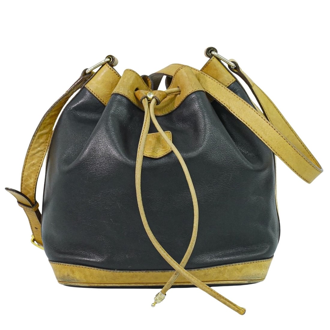Celine Sangle Bucket Leather Shoulder Bag Black Brown 20cm x 23cm x 13cm: Celine Sangle Bucket Leather Shoulder Bag Black Brown 20cm x 23cm x 13cm This Celine Bucket Sangle bag is crafted from black and brown leather and designed for women. The bag features a spacious inter