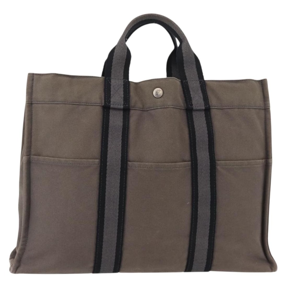 HERMES Fourre Tout MM Canvas Hand Bag Gray Silver Auth: HERMES Fourre Tout MM Canvas Hand Bag Gray Silver Auth This authentic HERMES Fourre Tout MM Hand Bag is a stylish and practical accessory crafted in France. Featuring a versatile gray and silver canva