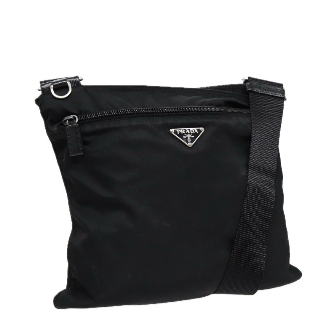 Prada Black Nylon Women's Shoulder Bag Italy Silver Trim: Prada Black Nylon Women's Shoulder Bag Italy Silver Trim This PRADA shoulder bag is crafted from durable black nylon with silver-tone accents. Designed for women, the bag features an adjustable should