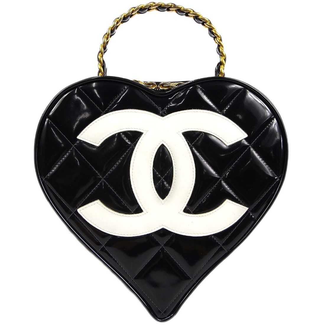 CHANEL Quilted Black Patent Leather Vanity Cosmetic Bag: CHANEL Quilted Black Patent Leather Vanity Cosmetic Bag This Chanel heart-shaped vanity handbag features black patent leather with a quilted matelasse pattern and a zip closure. Designed with a top ha
