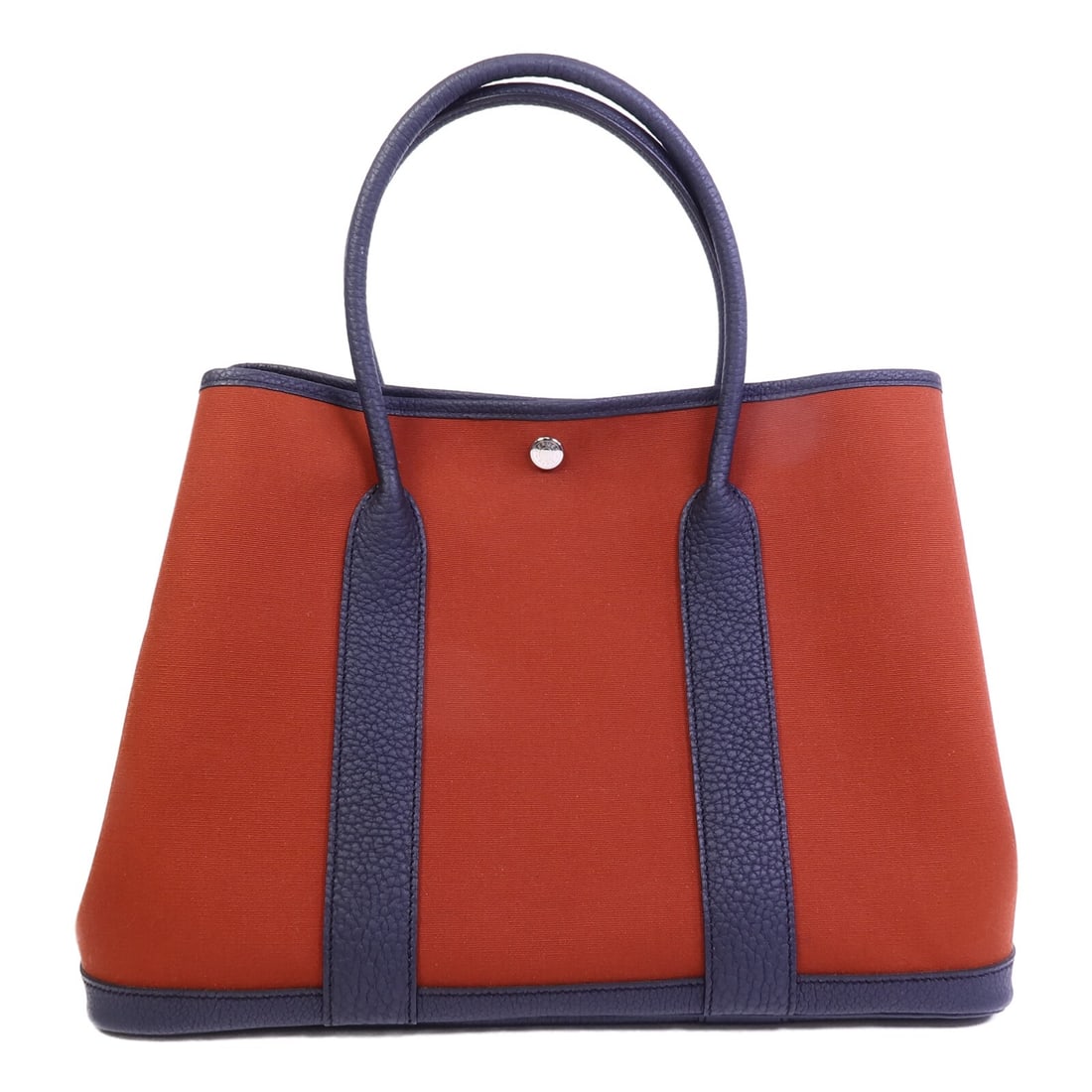 Hermes Garden Party PM canvas tote bag: Hermes Garden Party PM canvas tote bag This HERMES Garden Party PM tote bag features a canvas exterior in orange, complemented by Negonda leather accents in Cuivre and Bleu Indigo tones. Designed for 