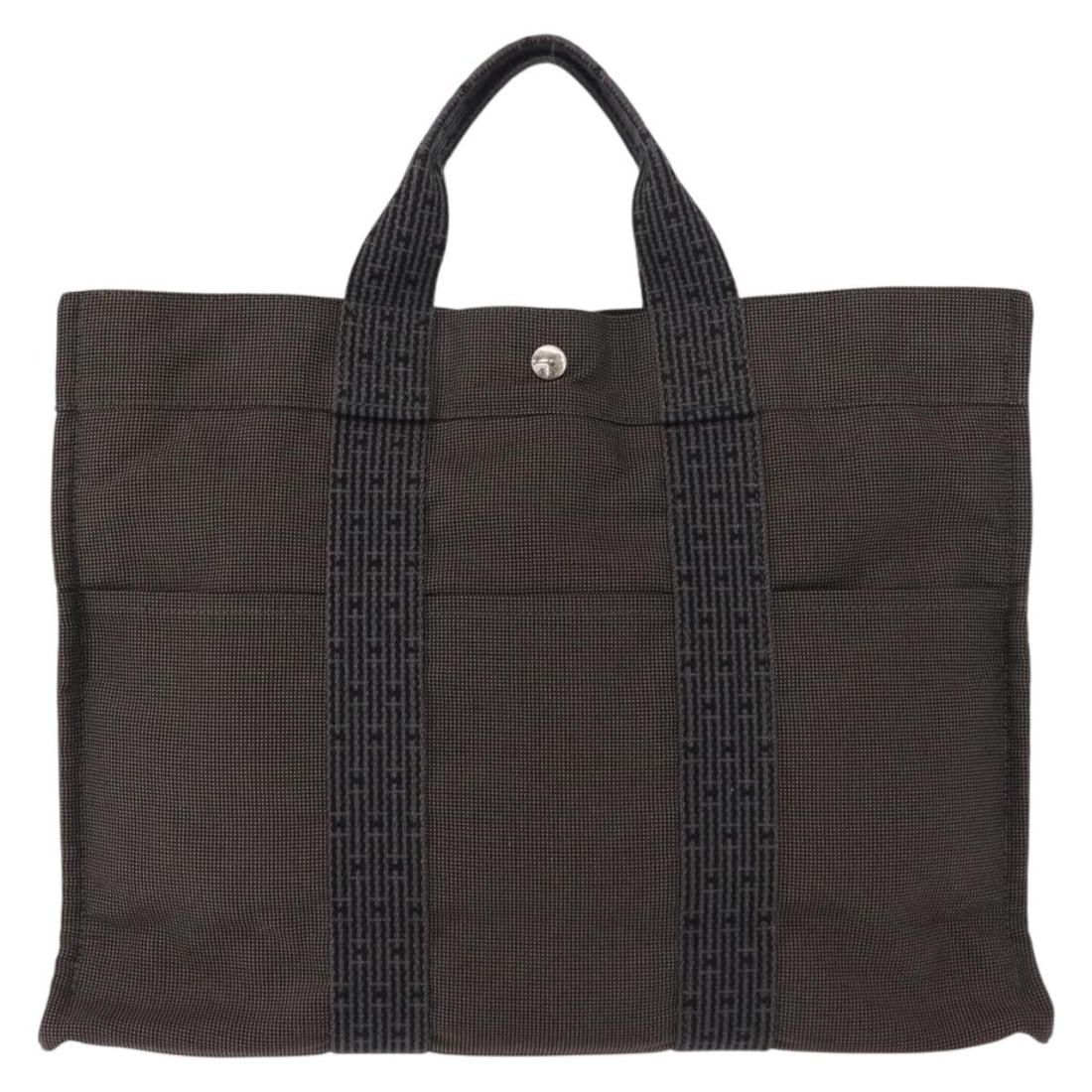 Hermes Herline Canvas Tote Bag Gray 44cm by 32cm by 10cm: Hermes Herline Canvas Tote Bag Gray 44cm by 32cm by 10cm This pre-owned Hermes Fourre-tout Herline handbag for women features a gray canvas construction with a spacious design. It shows signs of use i