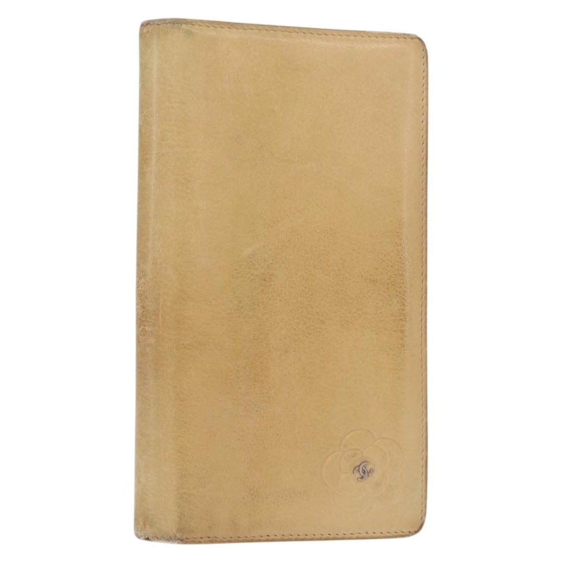 CHANEL Camelia Wallet Beige Leather with Guarantee Card: CHANEL Camelia Wallet Beige Leather with Guarantee Card Introducing the CHANEL Camelia Wallet, a luxurious accessory crafted from high-quality leather in a sophisticated beige hue. This wallet is desi