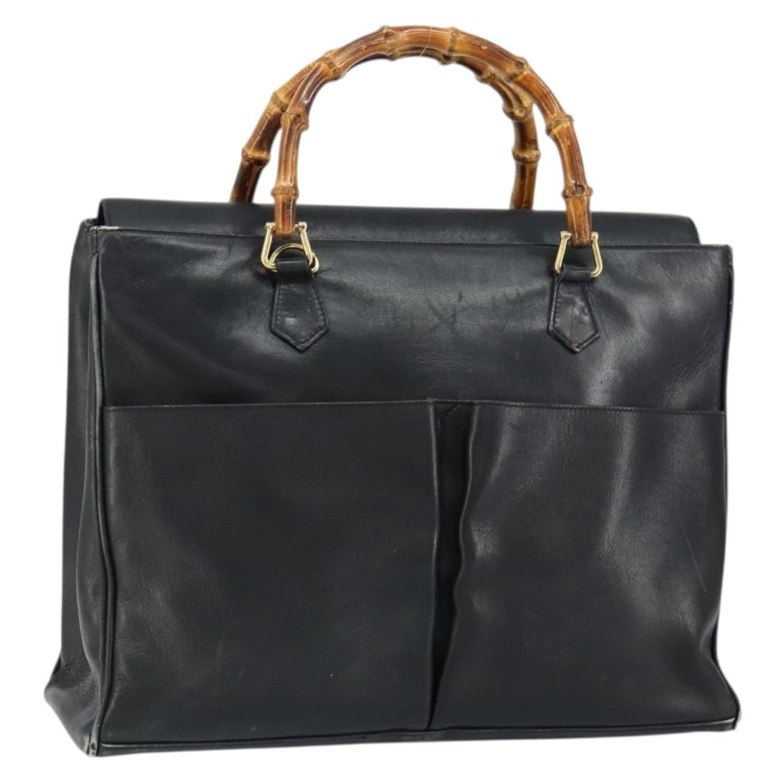 Gucci Bamboo leather black gold handbag Italy 002 2855 0322 0: Gucci Bamboo leather black gold handbag Italy 002 2855 0322 0 This GUCCI Bamboo handbag features a black leather exterior with gold accents and a distinctive bamboo handle. The bag is designed for wom