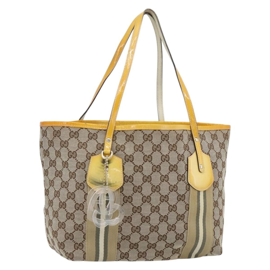 Gucci Sherry Line GG Canvas Tote Beige Gold 211971: Gucci Sherry Line GG Canvas Tote Beige Gold 211971 This GUCCI GG Canvas Sherry Line tote bag in beige and gold features the iconic GG canvas material and is designed for women. The bag includes a char