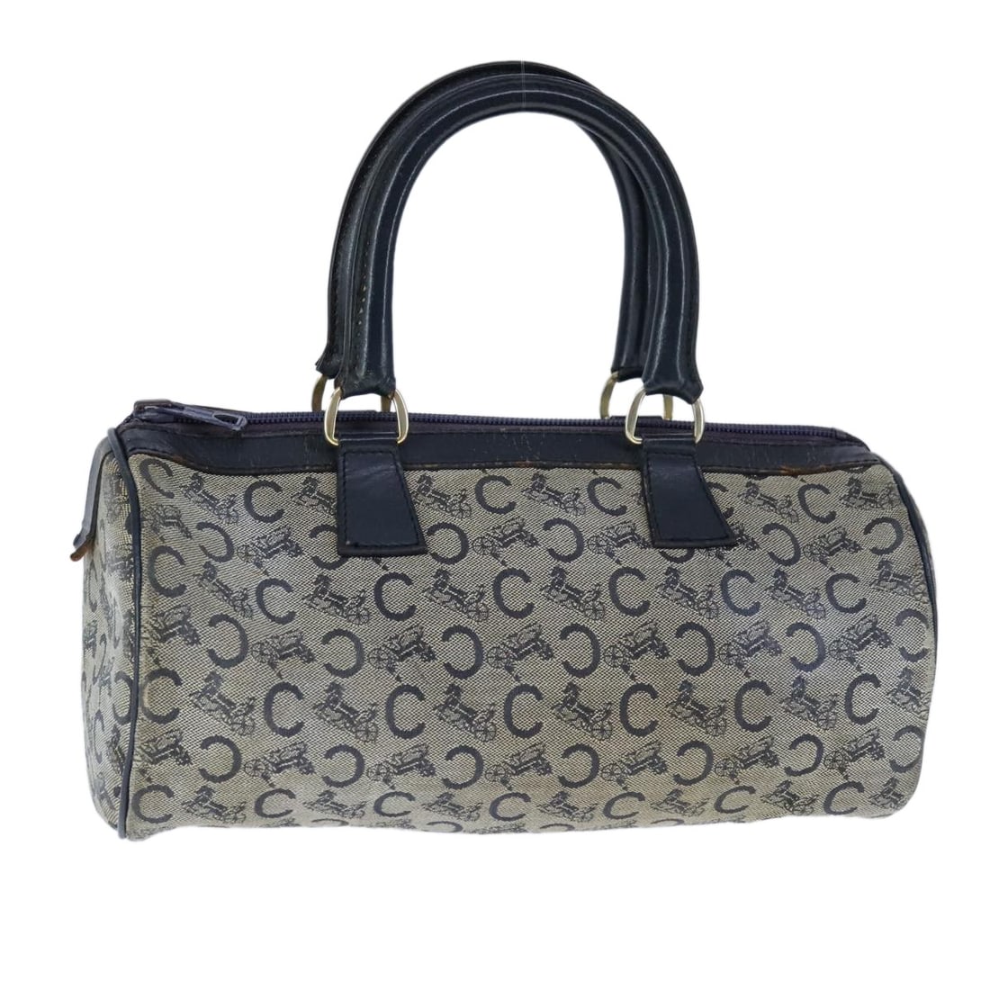 CELINE C Macadam navy canvas handbag made in France: CELINE C Macadam navy canvas handbag made in France This CELINE C Macadam Canvas Hand Bag features a classic navy canvas exterior with the signature Macadam pattern. Designed for women, the handbag of