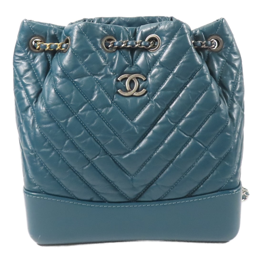 CHANEL Gabrielle Lambskin Rucksack Backpack Dark Green: CHANEL Gabrielle Lambskin Rucksack Backpack Dark Green This CHANEL Gabrielle Backpack features luxurious lambskin leather in a dark green hue. Designed in a rucksack style, it offers a sophisticated y