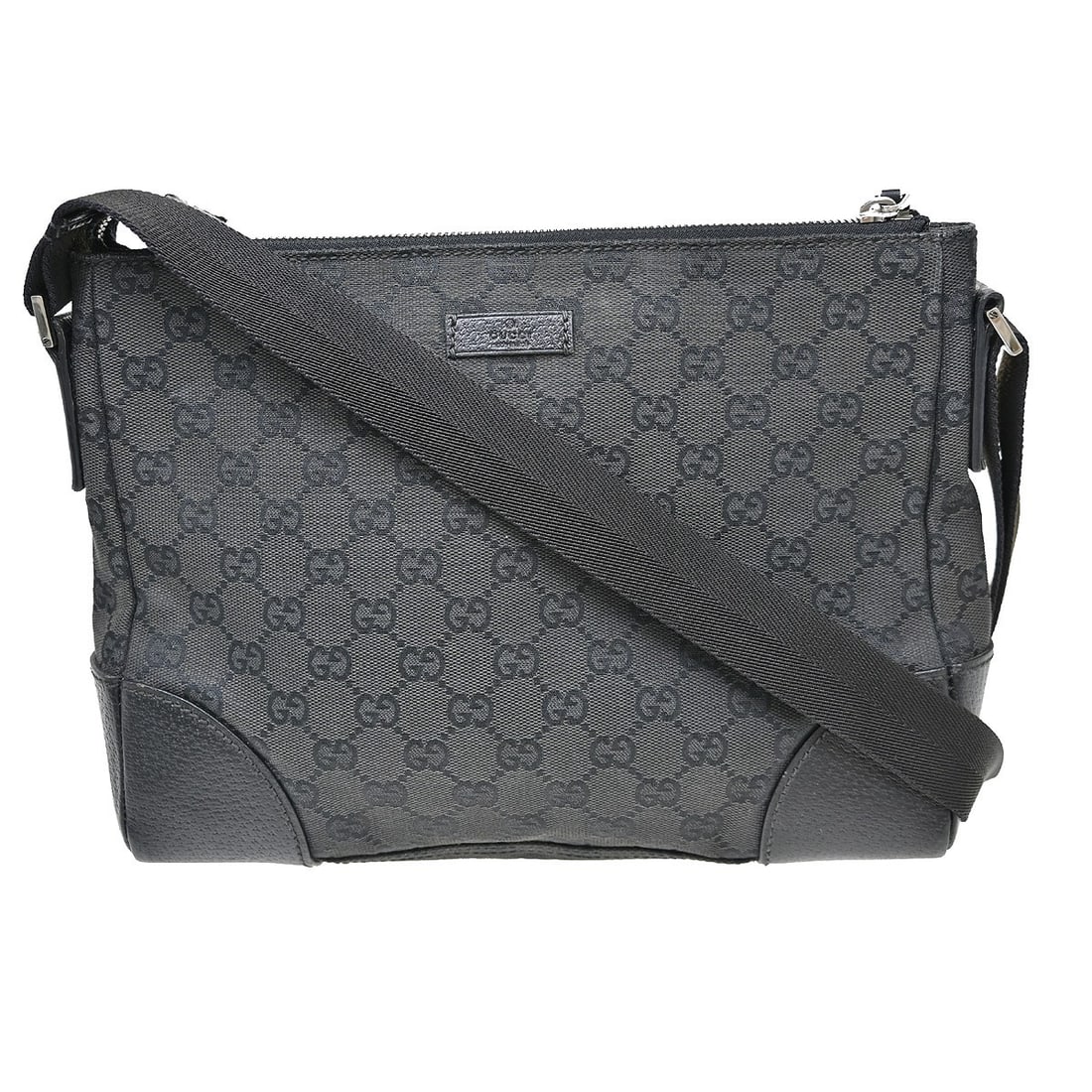 Gucci GG Black Canvas Leather Shoulder Bag: Gucci GG Black Canvas Leather Shoulder Bag This Gucci shoulder bag features the signature GG pattern in black canvas with leather accents. Designed for casual occasions, it offers a medium-sized silho