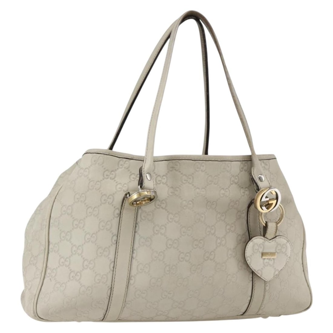 Guccissima GG Canvas and Leather Tote Bag Beige Gold 232957 Italy: Guccissima GG Canvas and Leather Tote Bag Beige Gold 232957 Italy This Gucci tote bag features a beige and gold GG canvas exterior combined with leather accents. It showcases a spacious design suitabl