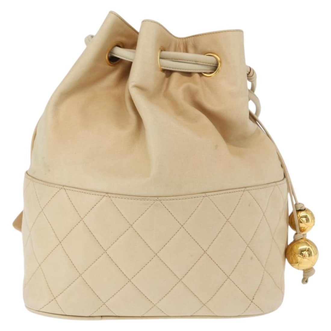 Beige Chanel Gabrielle Drawstring Leather Bag: Beige Chanel Gabrielle Drawstring Leather Bag This Chanel Gabrielle Drawstring Bag is crafted from quilted calfskin leather in a beige color. Designed for women, it features a drawstring closure and a
